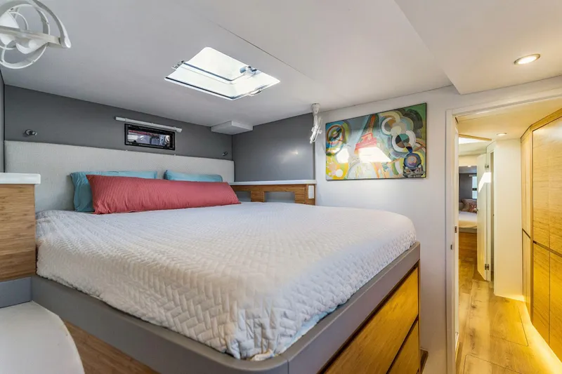 Gtfo Yacht Photos Pics Luxurious bedroom interior in 2024 Balance 482 yacht with modern decor and skylight.