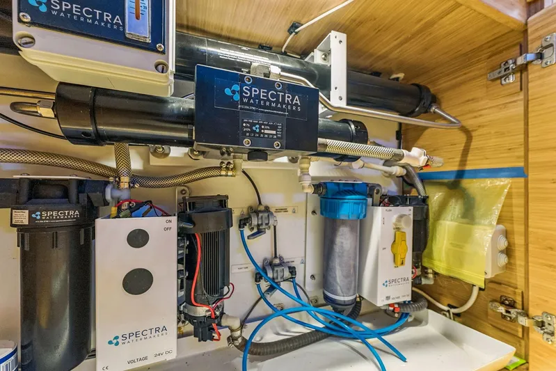 Gtfo Yacht Photos Pics Spectra watermaker system inside Balance 482, 2024 model, showcasing filtration components.