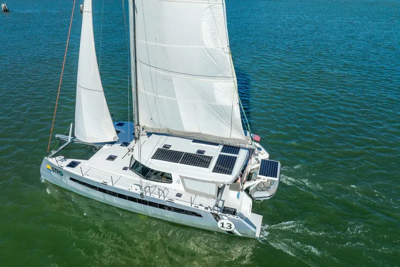 Gtfo Yacht Photos Pics Sailing catamaran Balance 482, 2024 model, with solar panels on open water.