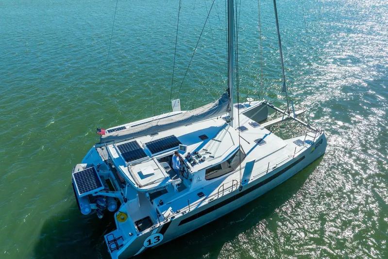 Gtfo Yacht Photos Pics 2024 Balance 482 catamaran with solar panels sailing on open water.