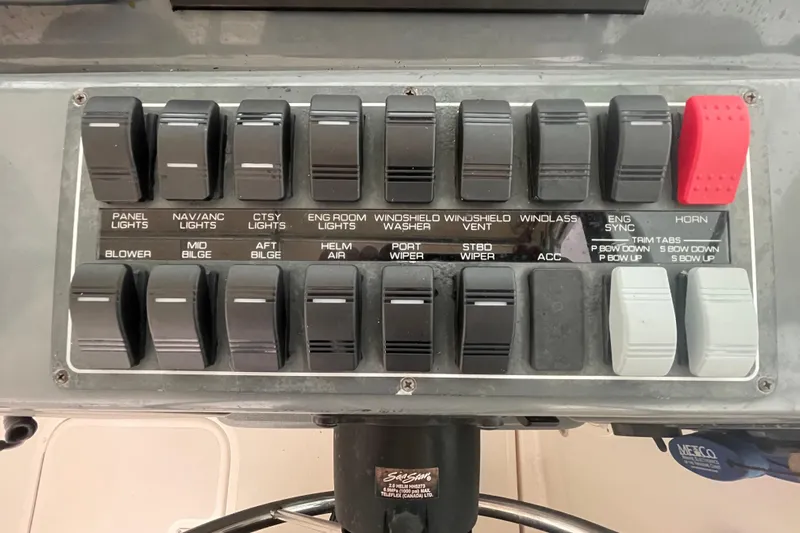  Yacht Photos Pics Control panel of a 2003 Tiara Yachts 3100 Open, featuring various switches and labels.