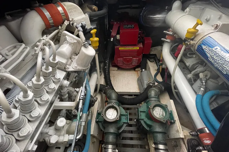  Yacht Photos Pics Engine compartment of a 2003 Tiara Yachts 3100 Open, showcasing mechanical components and systems.