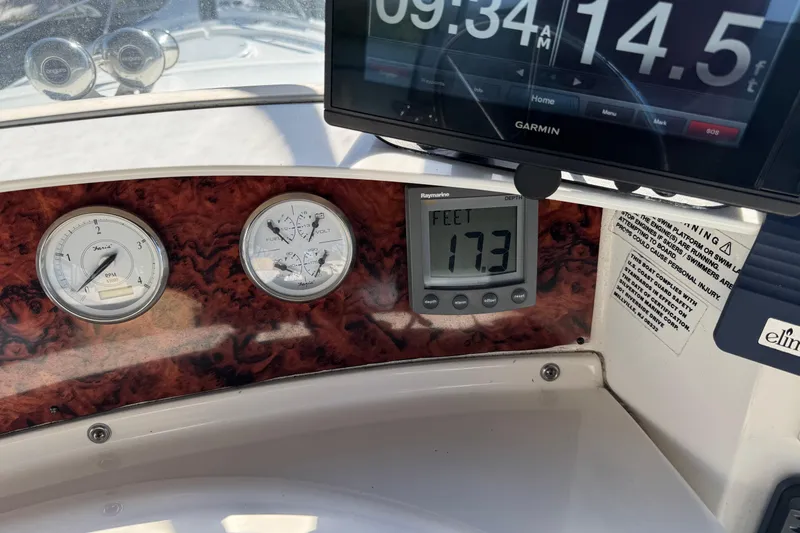  Yacht Photos Pics Dashboard of 2005 Silverton 43 Motor Yacht with gauges and Garmin display.