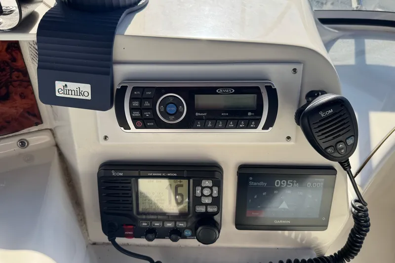  Yacht Photos Pics Control panel of a 2005 Silverton 43 Motor Yacht with radio and navigation equipment.