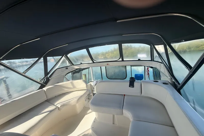  Yacht Photos Pics 2005 Silverton 43 Motor Yacht interior with spacious seating and panoramic windows.