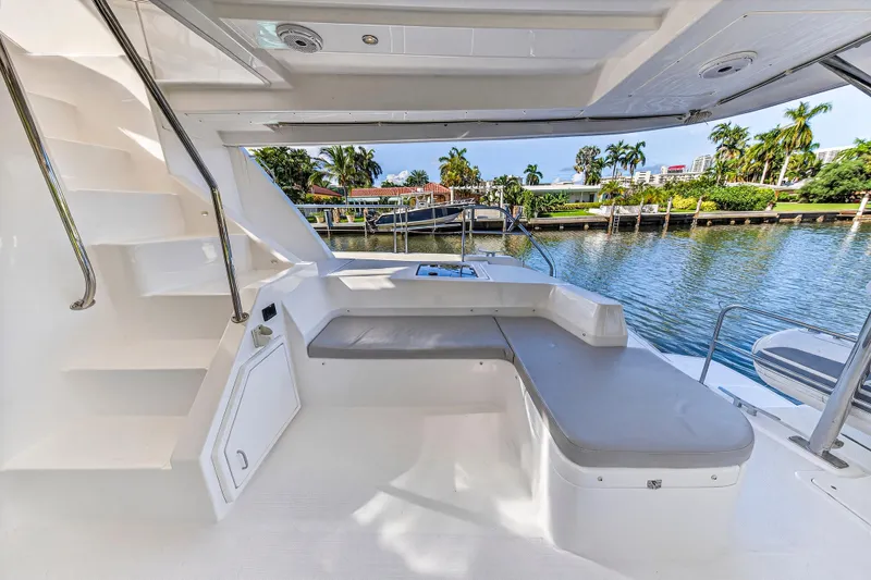 Southern Sky Yacht Photos Pics 2018 Leopard 51 Powercat yacht interior with seating area and water view.
