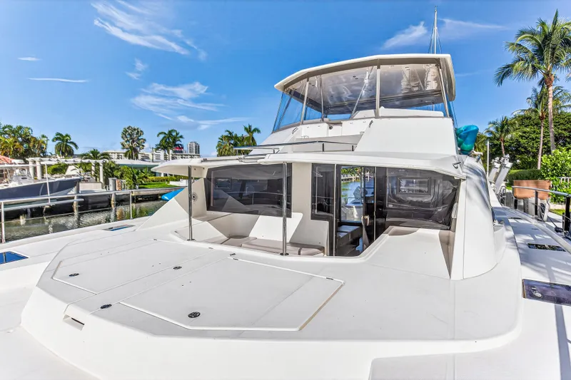 Southern Sky Yacht Photos Pics 2018 Leopard 51 Powercat yacht docked, featuring spacious deck and modern design.