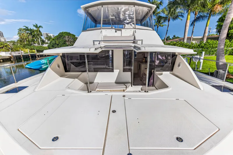 Southern Sky Yacht Photos Pics 2018 Leopard 51 Powercat yacht docked, showcasing spacious deck and modern design.