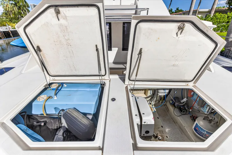 Southern Sky Yacht Photos Pics 2018 Leopard 51 Powercat storage compartments with equipment and wiring visible.