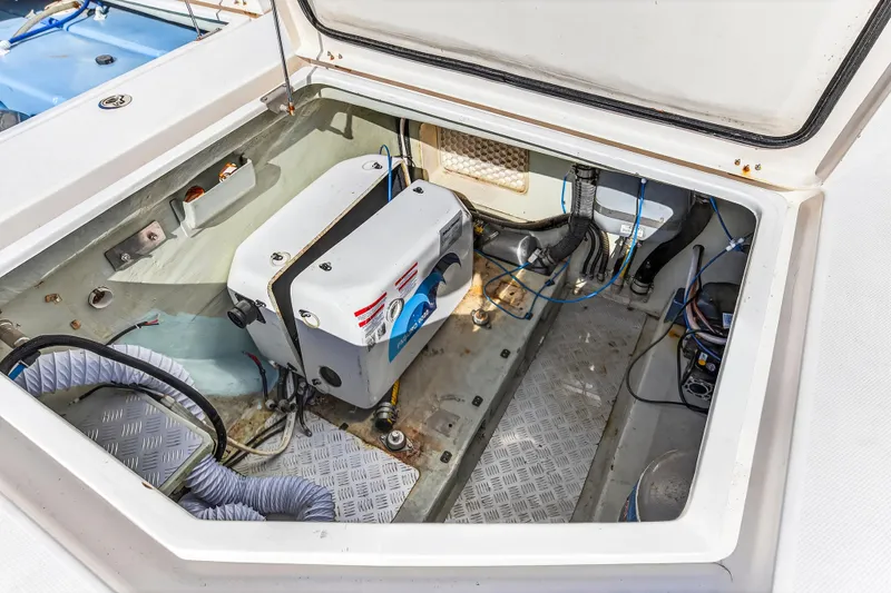 Southern Sky Yacht Photos Pics Engine compartment of 2018 Leopard 51 Powercat, showcasing mechanical components and wiring.