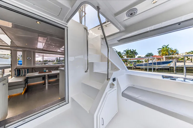 Southern Sky Yacht Photos Pics 2018 Leopard 51 Powercat interior with modern seating and sleek staircase design.