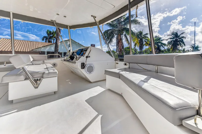 Southern Sky Yacht Photos Pics Interior of 2018 Leopard 51 Powercat yacht with modern seating and panoramic windows.