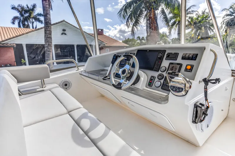 Southern Sky Yacht Photos Pics 2018 Leopard 51 Powercat helm with modern controls and tropical backdrop.