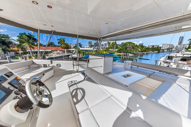 Southern Sky Yacht Photos Pics Luxurious 2018 Leopard 51 Powercat yacht interior with spacious seating and scenic marina view.