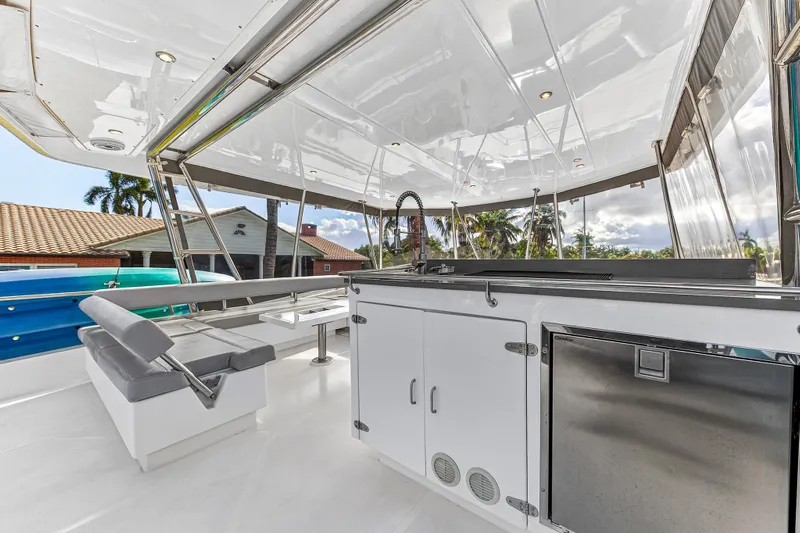 Southern Sky Yacht Photos Pics 2018 Leopard 51 Powercat yacht interior with sleek kitchen and seating area.