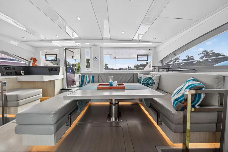 Southern Sky Yacht Photos Pics Luxurious interior of 2018 Leopard 51 Powercat yacht with modern seating and decor.