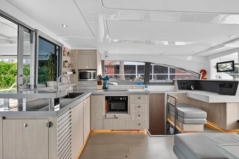 Southern Sky Yacht Photos Pics Modern kitchen interior of 2018 Leopard 51 Powercat yacht with sleek design and ample amenities.