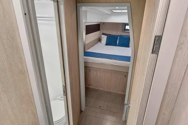 Southern Sky Yacht Photos Pics Interior cabin of 2018 Leopard 51 Powercat with bed and bathroom.