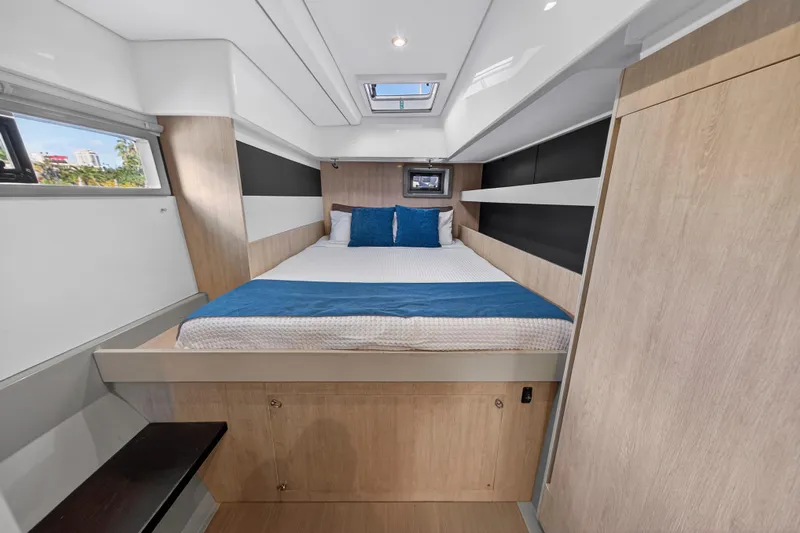 Southern Sky Yacht Photos Pics Luxurious cabin interior of 2018 Leopard 51 Powercat with modern design and comfortable bedding.