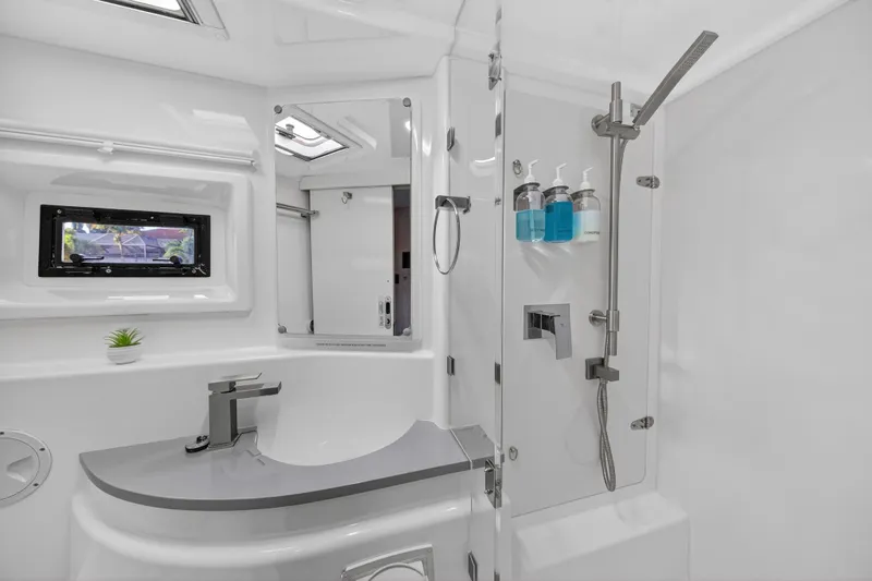 Southern Sky Yacht Photos Pics Modern bathroom in 2018 Leopard 51 Powercat yacht with sleek fixtures and shower amenities.