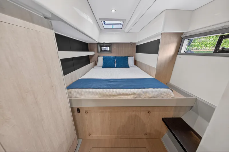 Southern Sky Yacht Photos Pics Luxurious cabin interior of 2018 Leopard 51 Powercat with modern design and comfortable bedding.