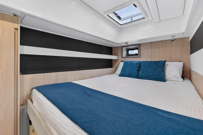 Southern Sky Yacht Photos Pics Interior cabin of 2018 Leopard 51 Powercat with bed and skylight.