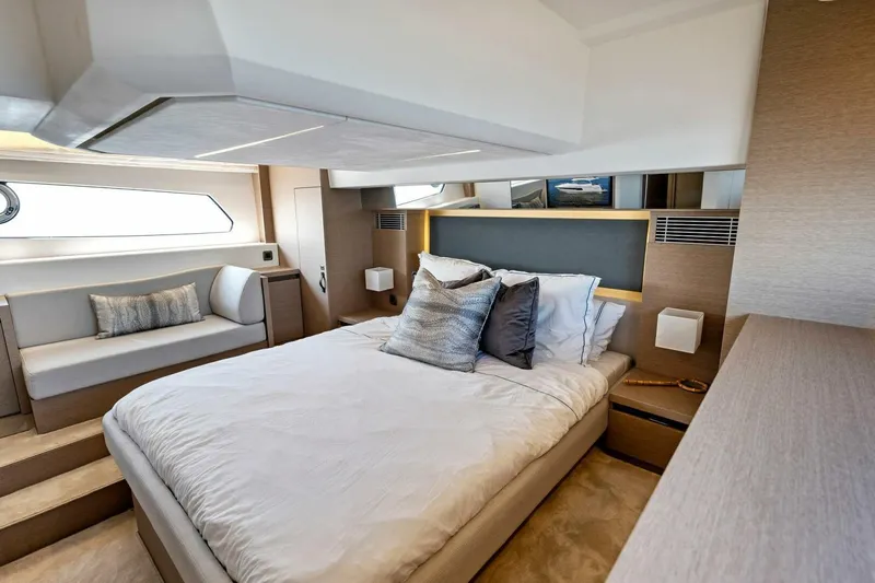 Jilligans Island Yacht Photos Pics Luxurious bedroom interior of 2023 Prestige 460 Flybridge yacht.