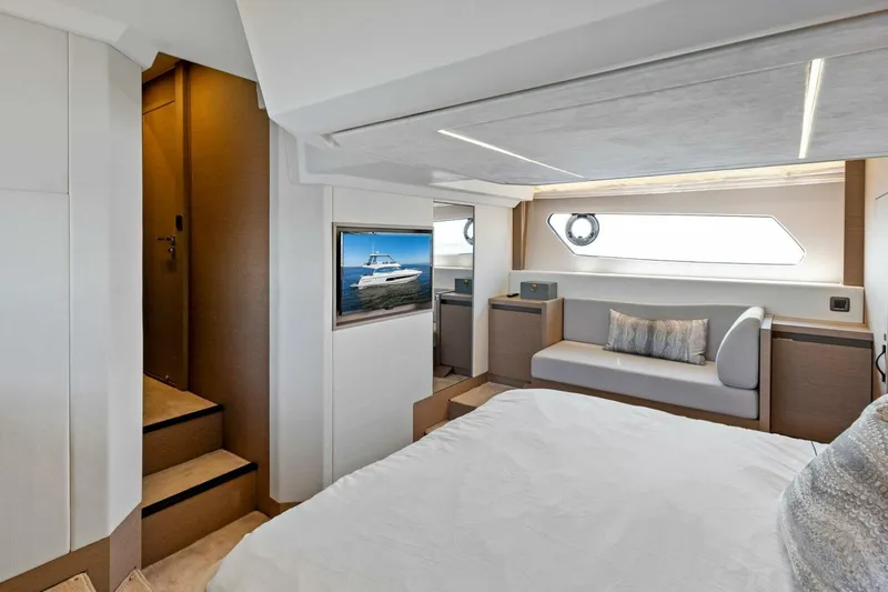 Jilligans Island Yacht Photos Pics Luxurious interior of 2023 Prestige 460 Flybridge yacht cabin with modern design.