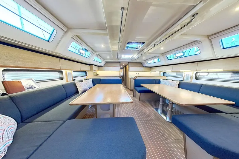 Sea Wave Yacht Photos Pics Luxurious interior of 2024 Kufner 54 yacht with spacious seating and modern design.