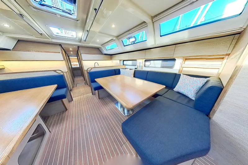 Sea Wave Yacht Photos Pics Luxurious interior of 2024 Kufner 54 yacht with spacious seating and modern design.