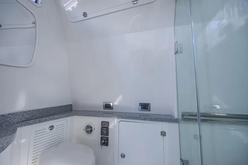 2022 425 Yamahas Yacht Photos Pics 2019 HCB 53 Sue&ntilde;os boat interior with modern bathroom amenities and sleek design.