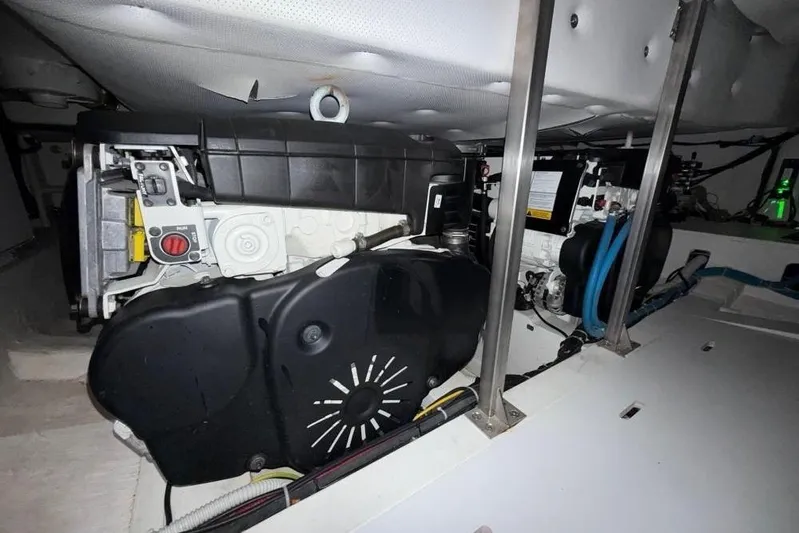  Yacht Photos Pics Engine room of 2022 Solaris Power 44 yacht, showcasing mechanical components and wiring.