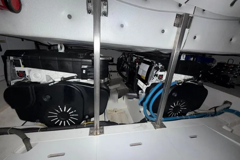  Yacht Photos Pics Engine room of 2022 Solaris Power 44 yacht, showcasing dual engines and mechanical components.