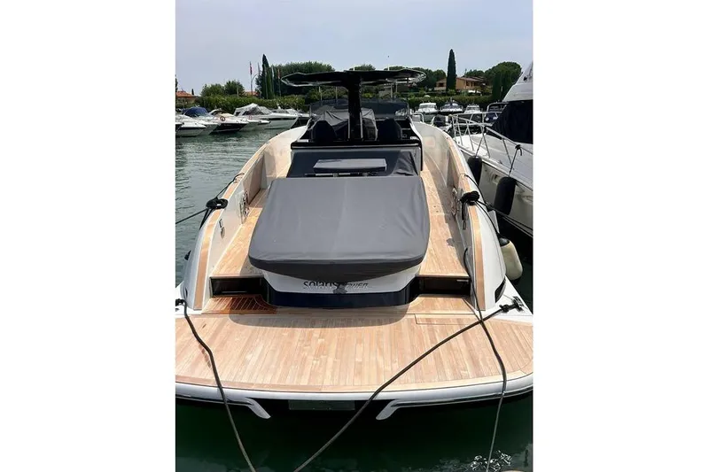  Yacht Photos Pics 2022 Solaris Power 44 yacht docked, featuring sleek design and spacious deck.