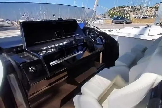  Yacht Photos Pics Helm of 2022 Solaris Power 44 yacht with sleek design and modern controls.