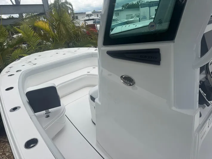  Yacht Photos Pics 2026 Blackfin 262 HB boat interior with sleek white design and modern features.