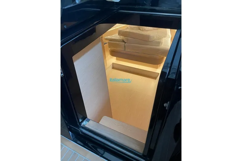  Yacht Photos Pics Interior view of 2024 Solaris Power 44 Open yacht, showcasing modern design and seating area.