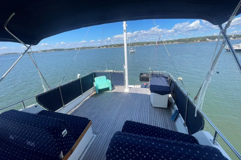 Island Girl Yacht Photos Pics Spacious deck of 1990 Grand Banks 46 Classic yacht with scenic water view.