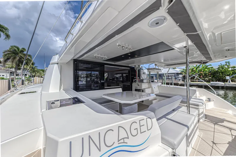  Yacht Photos Pics 2020 Leopard 45 yacht with spacious outdoor seating and modern design.