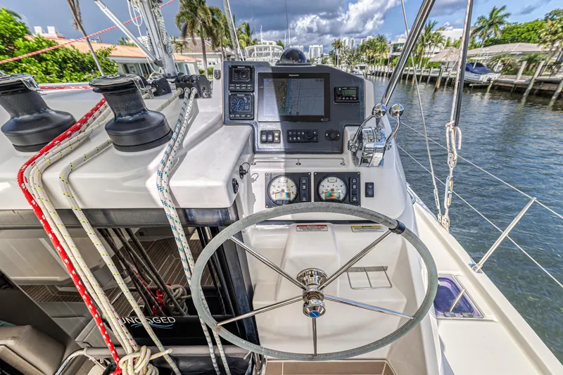  Yacht Photos Pics Helm of 2020 Leopard 45 catamaran with navigation instruments and steering wheel.