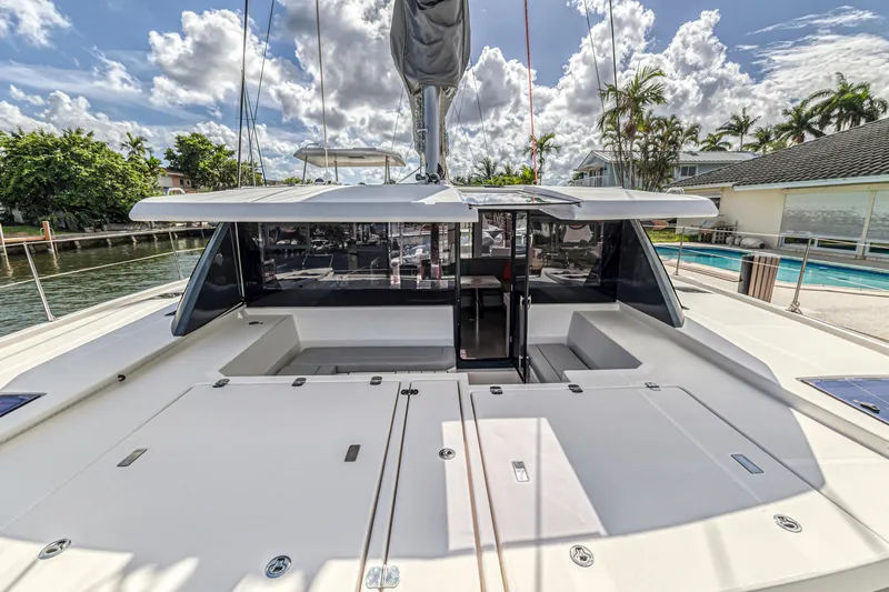 Yacht Photos Pics 2020 Leopard 45 catamaran deck with spacious seating and modern design.