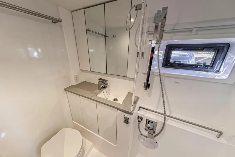  Yacht Photos Pics Modern bathroom in 2020 Leopard 45 yacht with sleek fixtures and compact design.