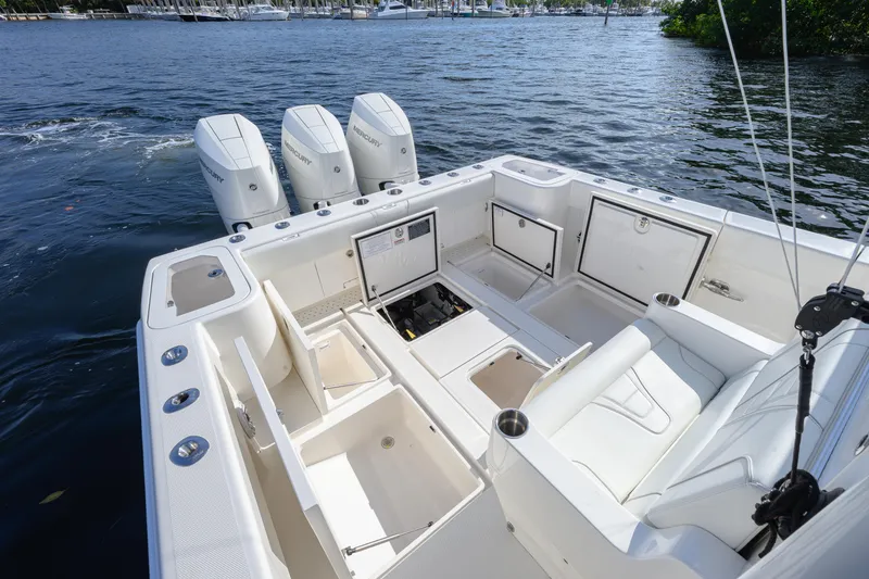  Yacht Photos Pics 2025 SeaVee 370Z boat with spacious deck and four powerful outboard engines.