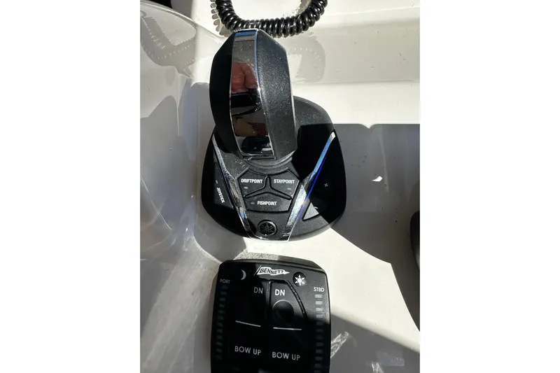  Yacht Photos Pics Control panel of 2023 Grady-White Freedom 307 boat with joystick and trim controls.