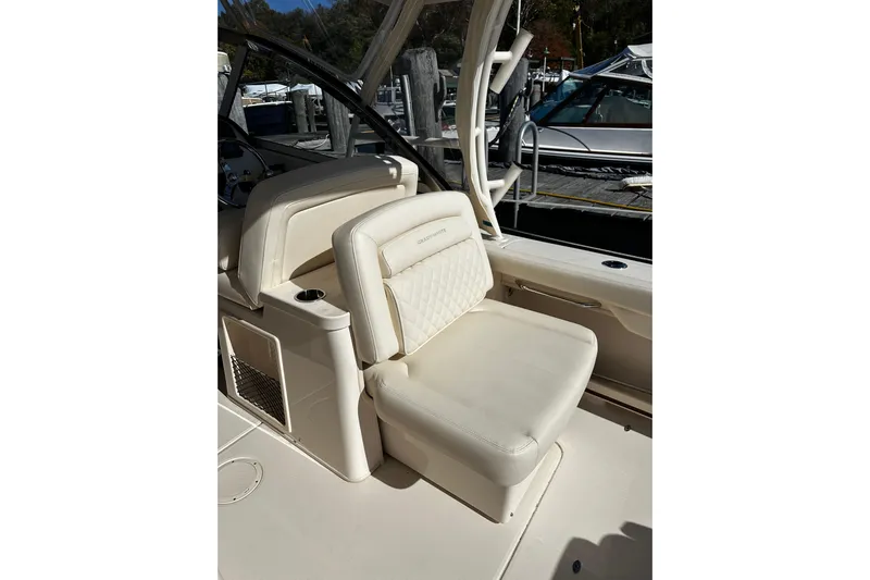  Yacht Photos Pics 2023 Grady-White Freedom 307 boat interior with luxurious seating.