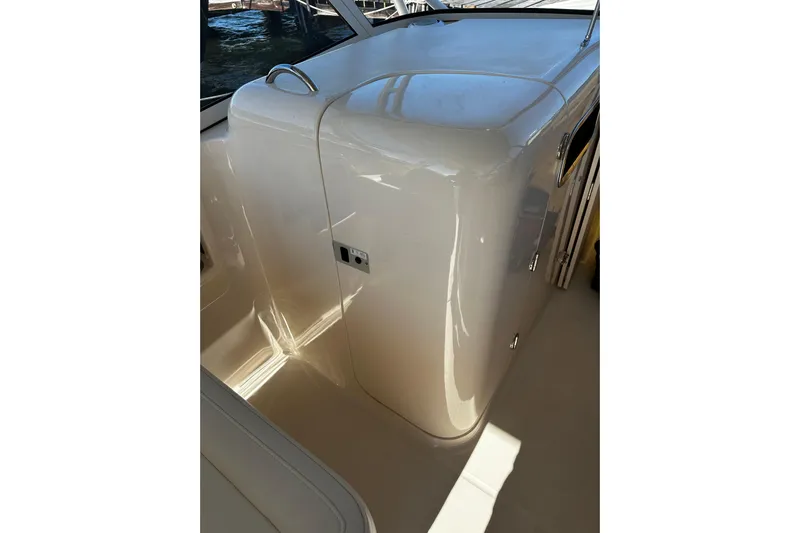  Yacht Photos Pics 2023 Grady-White Freedom 307 boat interior with sleek, glossy finish and modern design.