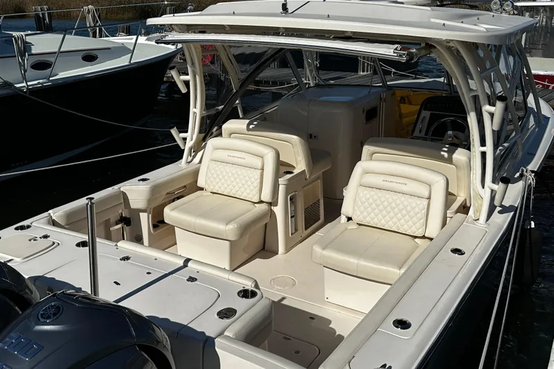  Yacht Photos Pics 2023 Grady-White Freedom 307 boat interior with luxurious seating and modern design.