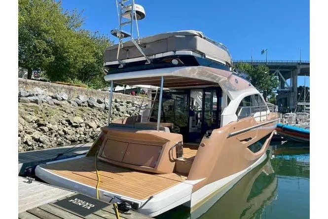  Yacht Photos Pics 2025 Sessa Marine F47 yacht docked, showcasing sleek design and luxurious features.