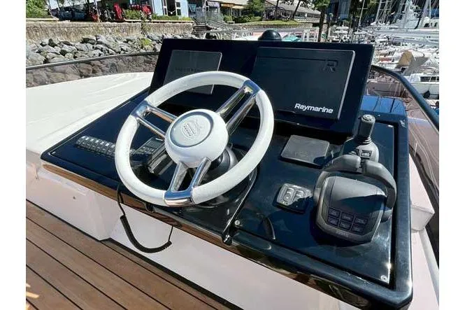  Yacht Photos Pics Helm of 2025 Sessa Marine F47 yacht with Raymarine navigation system.