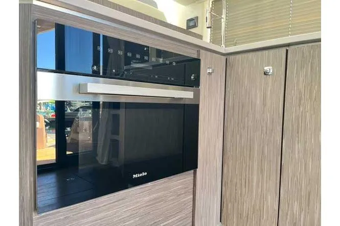  Yacht Photos Pics Modern kitchen interior of 2025 Sessa Marine F47 yacht with sleek Miele oven.